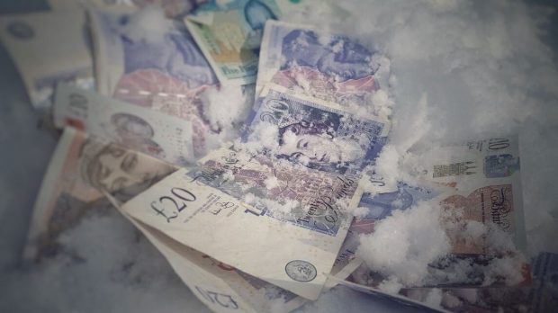 £20 notes lying in snow