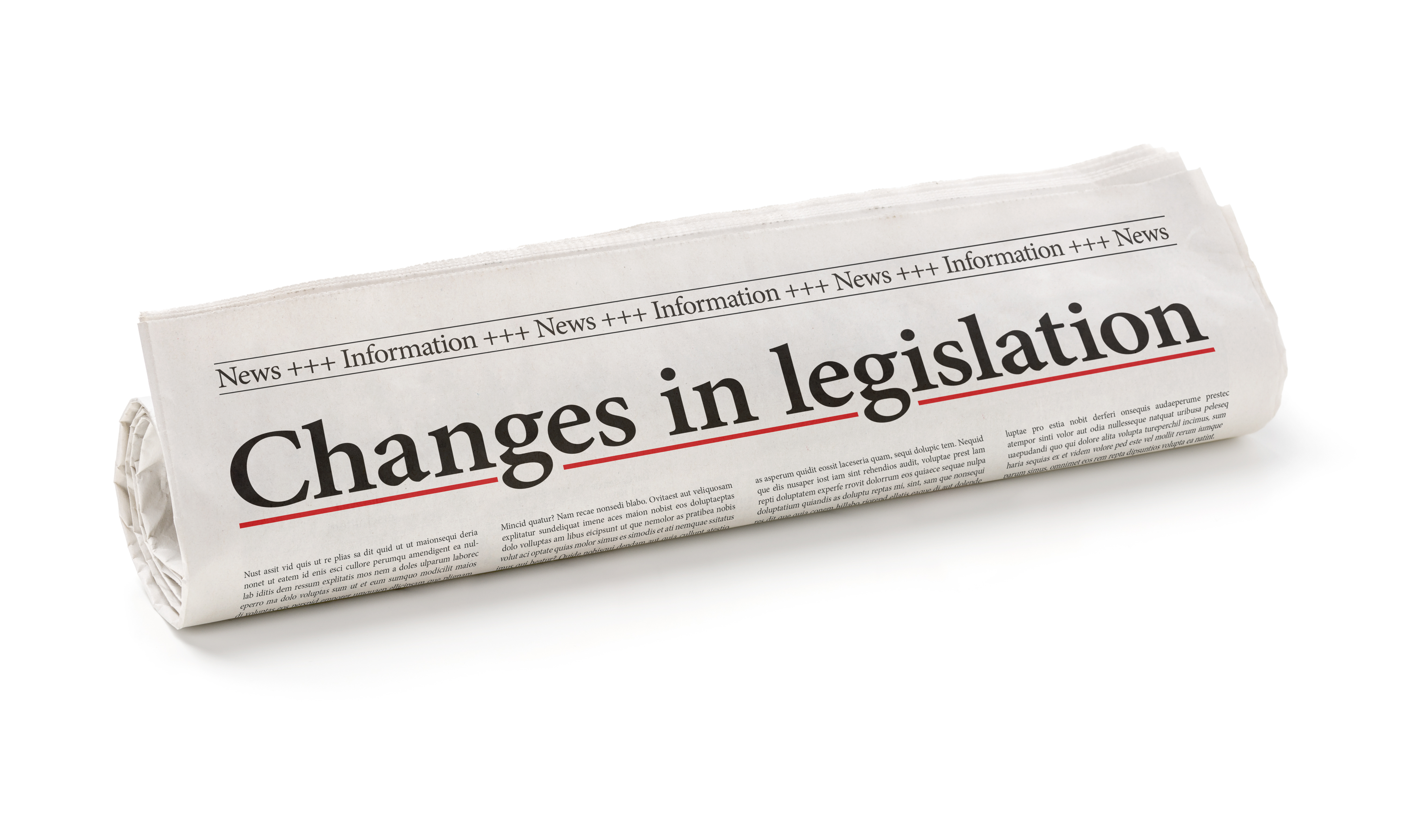 Rolled newspaper with the headline Changes in legislation